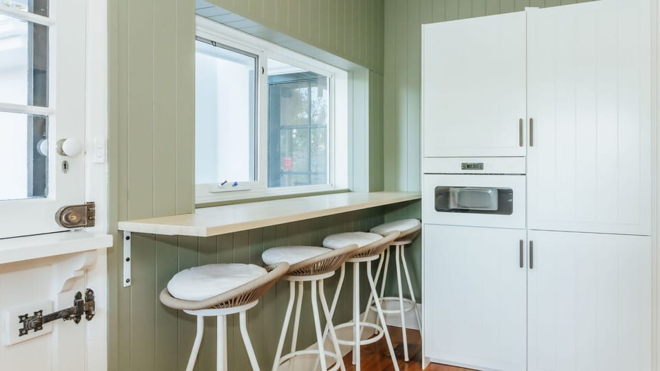 New Kitchen, Intergrated fridge, microwave, pantry, step outside into the courtyard.