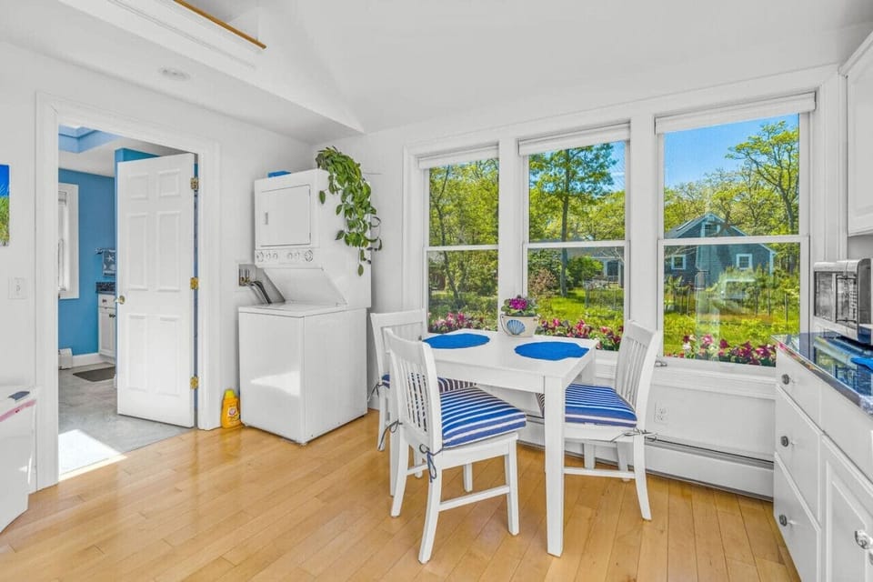 Your private kitchenette with a Keurig & K-cups, fridge, microwave, toaster, all the dish ware and utensils you'd need, lots of natural light, and seating for 3 at the dining table.
