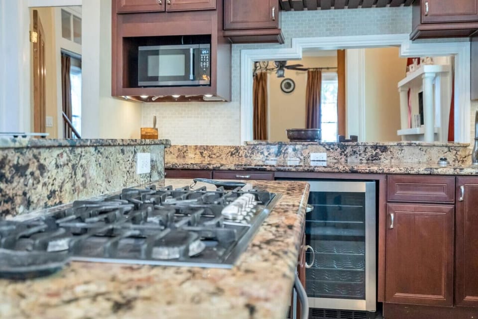 Large gas stovetop and wine cooler