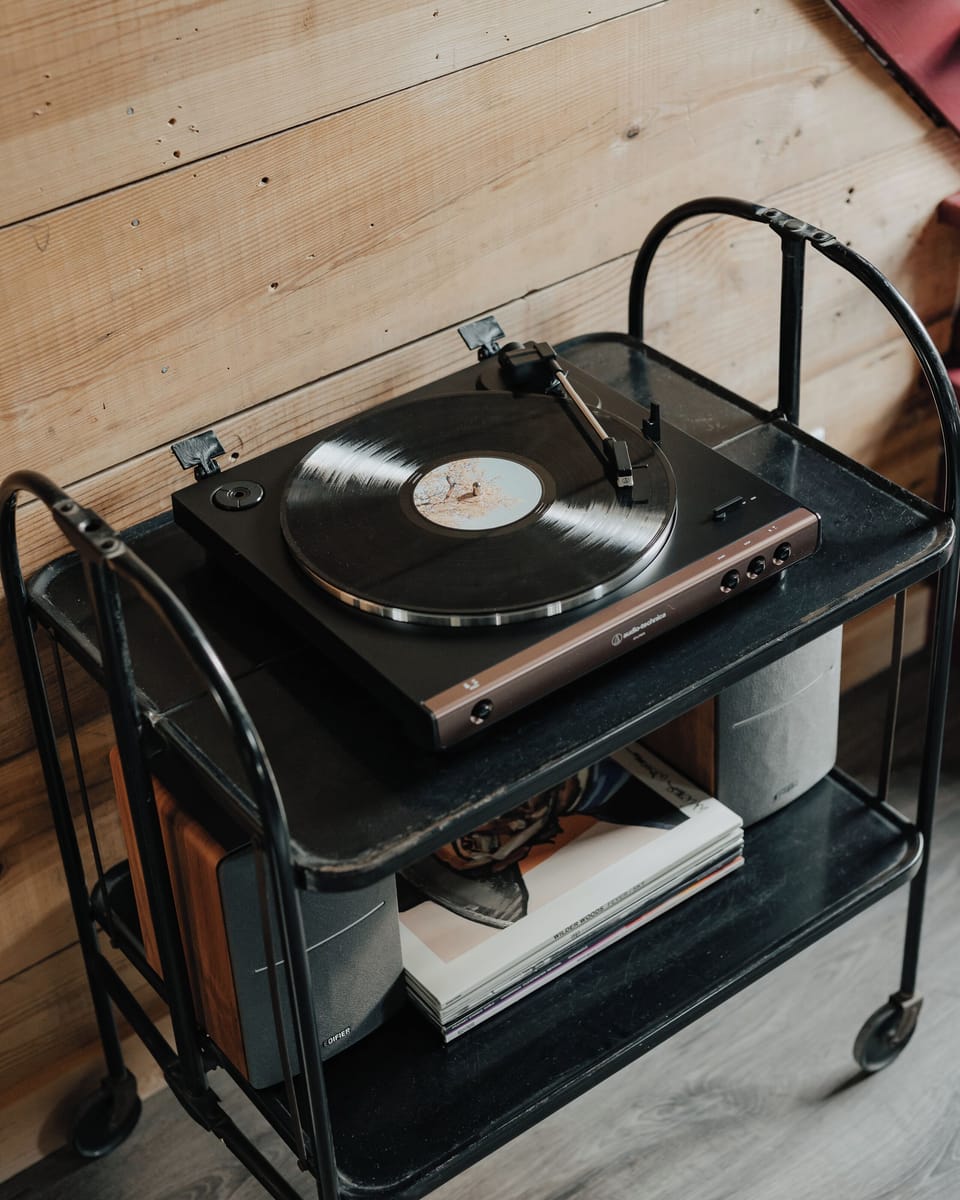 This nostalgic centerpiece invites you to unwind and immerse yourself in the timeless melodies of yesteryears. The record player adds a touch of retro charm to your stay, creating memories that resonate long after the needle lifts from the groove.