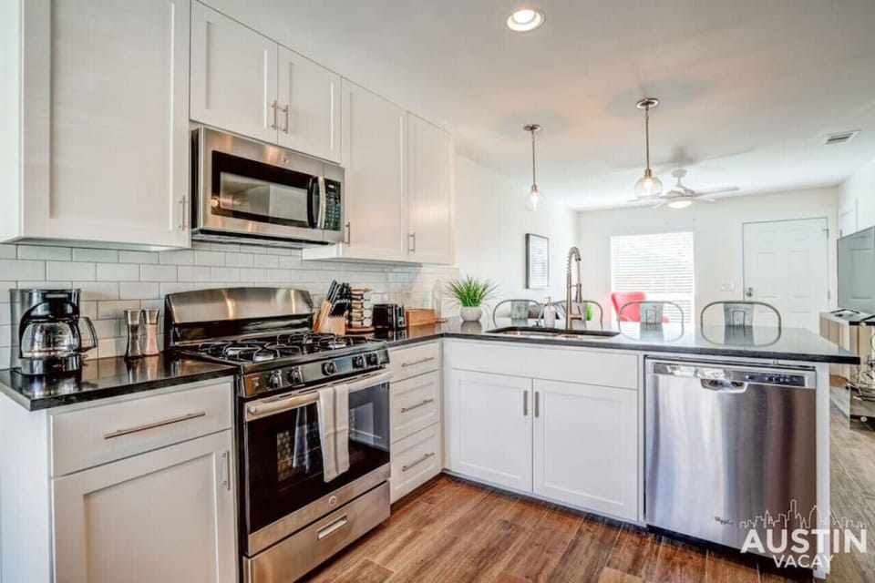 Fully stocked kitchen with dishwasher