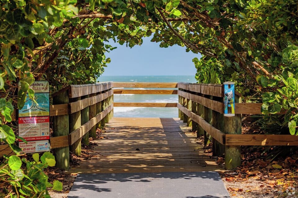 Stroll the shaded boardwalk and feel the sea breeze.