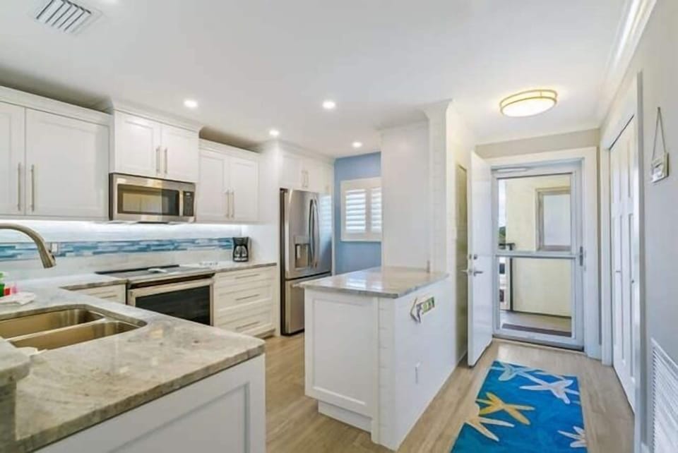 Front Entrance - Walk into a totally remodeled, Gold rated condominium.