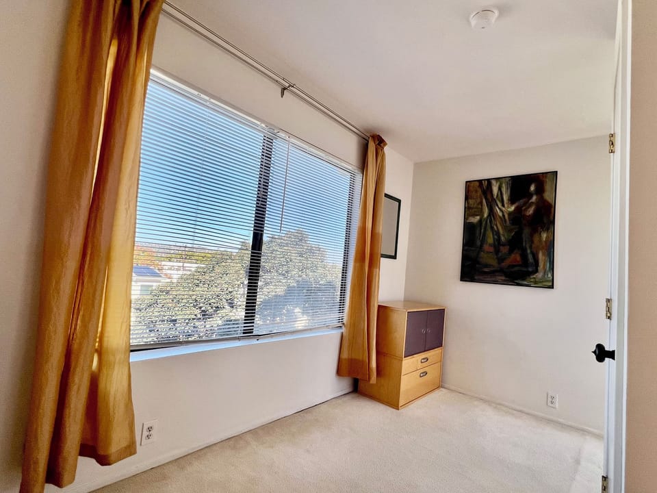 Long narrow enclosable loft space for office or extra bedroom.  Views abound.