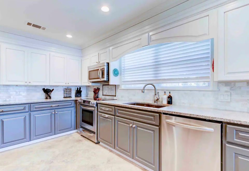 This bright and inviting kitchen space is perfect for any home chef, combining functionality with style.