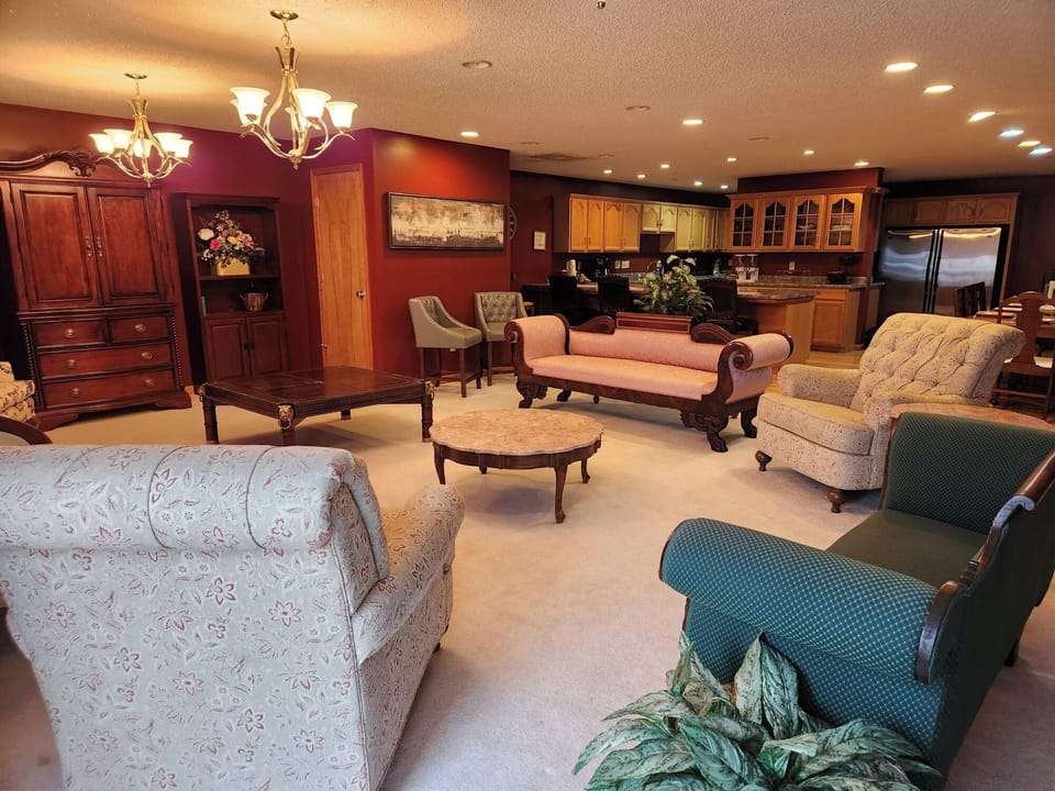 Large living room, with movies, board games and books for everyone.