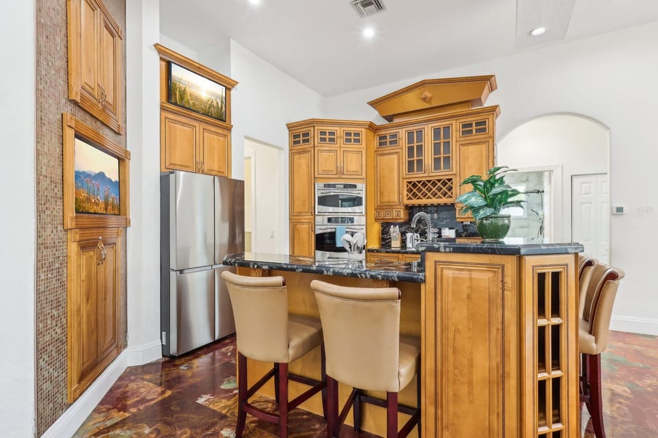 Kitchen includes utensils and essentials for preparing reunion style meals.