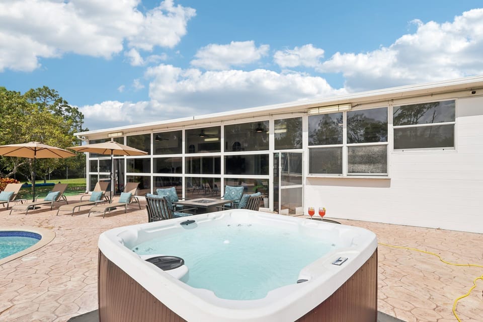 The hot tub comfortably fits up to 7 guests, offering the perfect spot to relax.