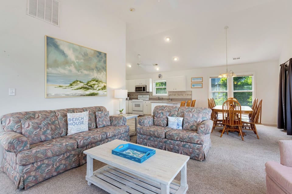 Spend your days relaxing on the Top Level where a spacious Living Area with a Flat Screen TV beckons.