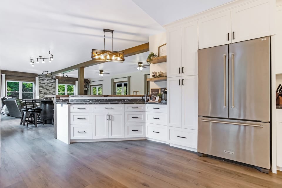 The large kitchen is located next to the living room so that no-one has to miss out on the fun!