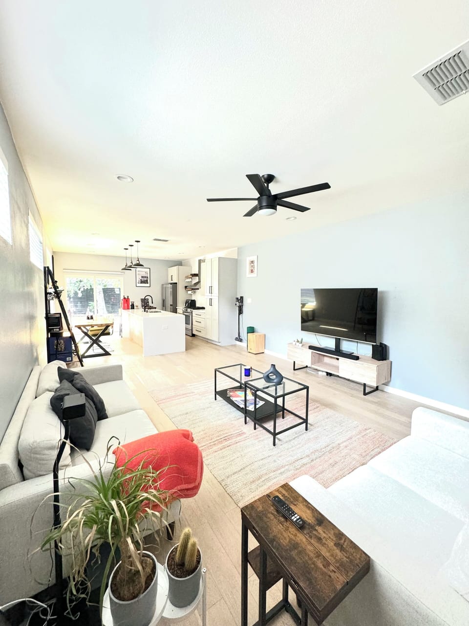 The living room is a generous space designed for entertainment.