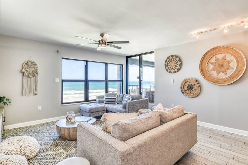 Welcome to Sand Dollar 306, a beachfront condo where modern coastal decor and amazing views can be enjoyed throughout!