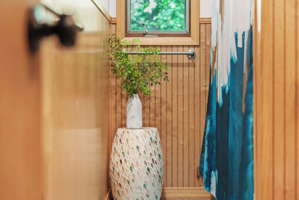 Bathroom 1 offers a shower/tub combo.