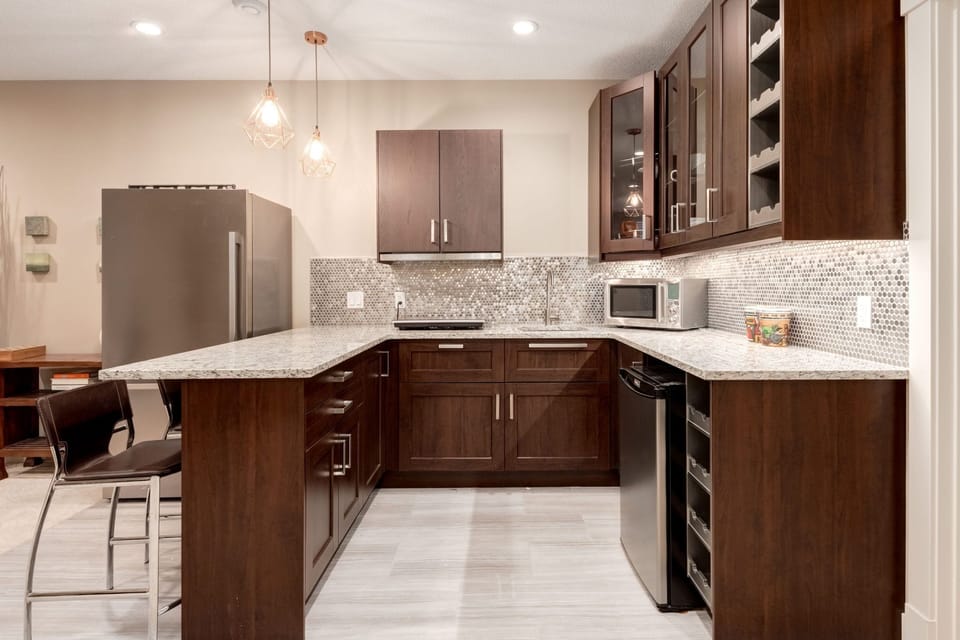 This kitchenette has lots of light and storage