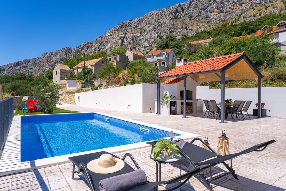The ideal location for enjoyment in a cozy and pristine setting, offering breathtaking views of the sea and islands