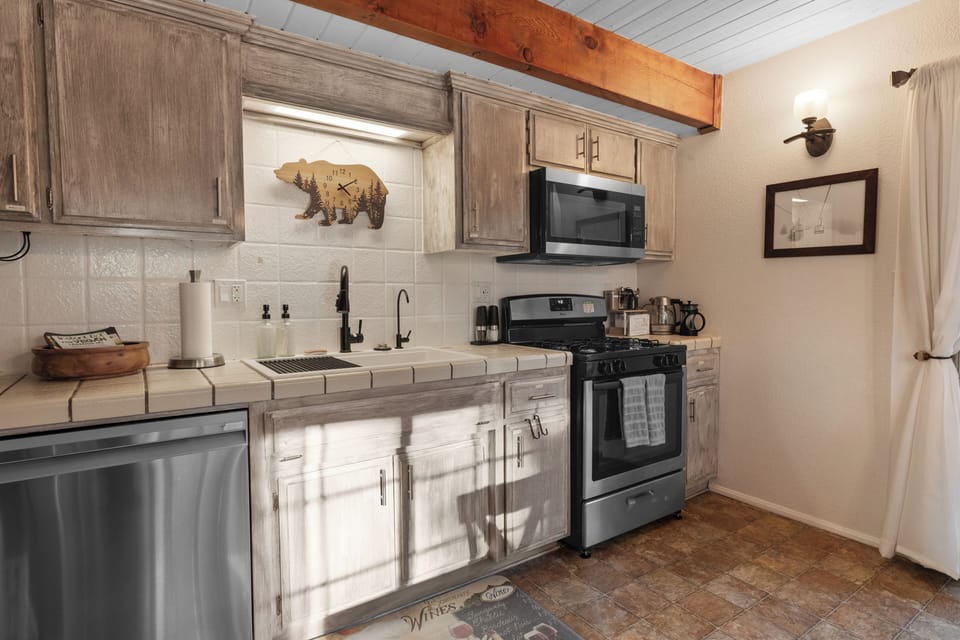 Fully stocked with appliances, pots, pans, spices, oils, coffee, and more!
