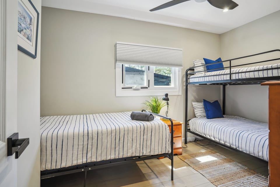 Bedroom #3: room for the kids - bunk beds and a single bed plus dresser. 