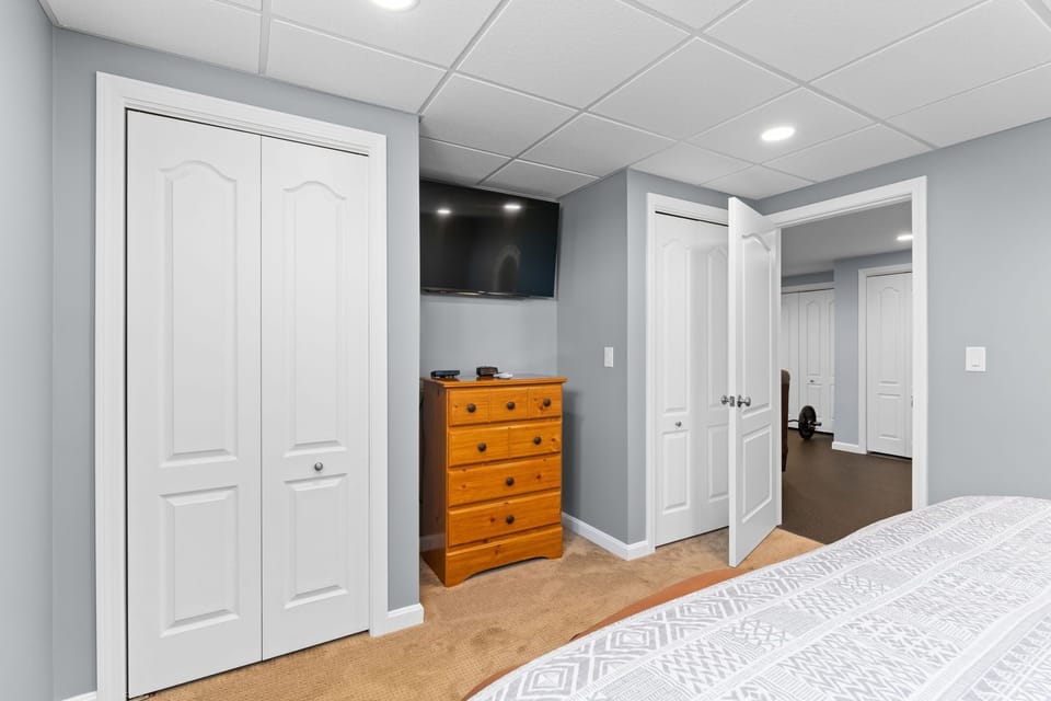 Bedroom 3 has a queen bed and TV with DirecTV. 