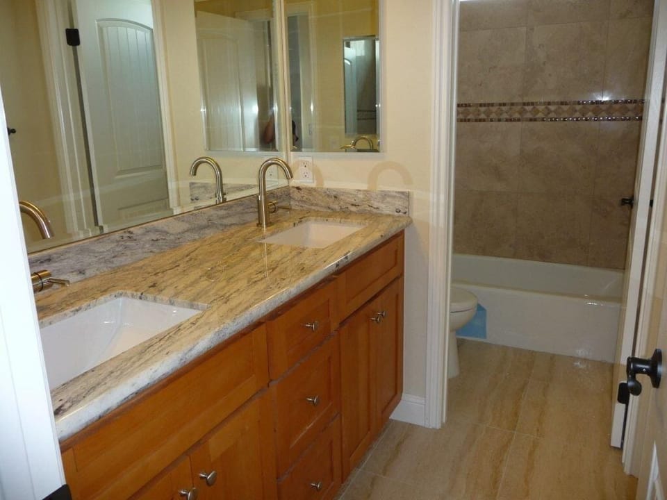 Bathroom uniquely designed to accommodate 2 or 3 people simultaneously.