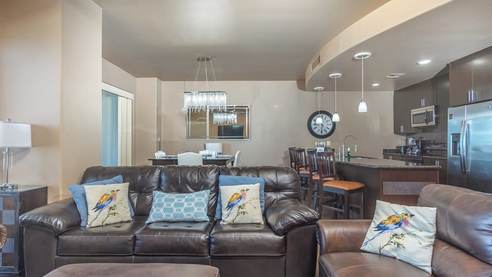 Two leather sofas define the living room.