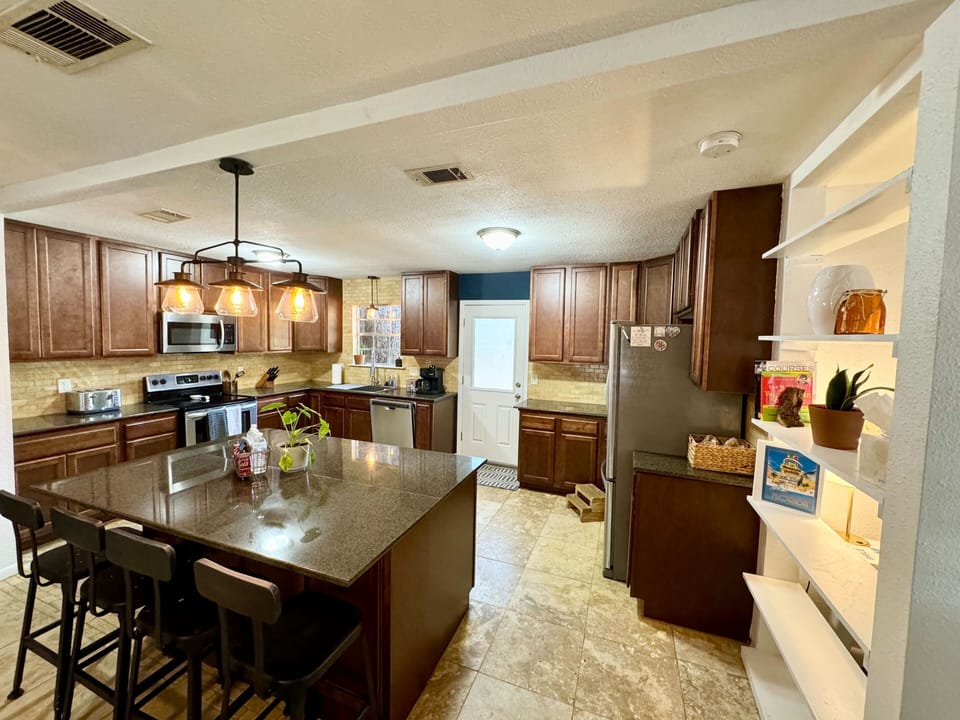kitchen island with bar stools