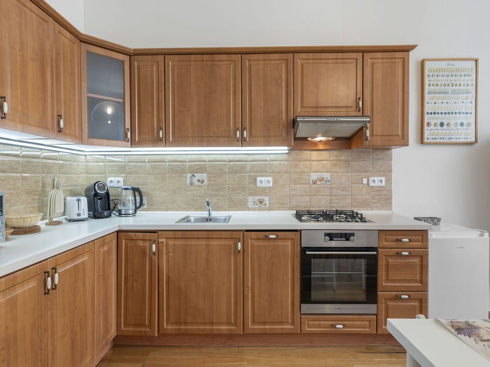 Kitchen, Cabinetry, Countertop, Kitchen Appliance, Major Appliance, Wood, Flooring, Furniture, Sink, Interior Design