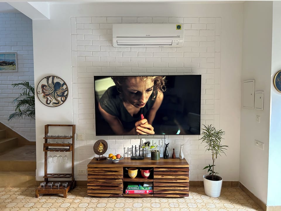 A 70 inch smart tv, perfect for movie nights with your loved ones.