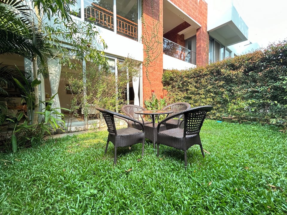 patio seating in the private garden which is attached to the living room