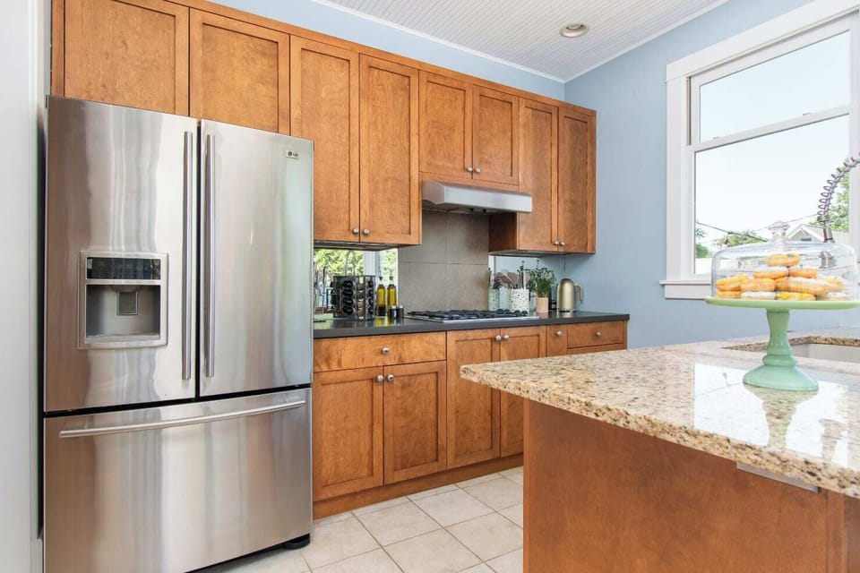 Cook up your favorites with our complete kitchen setup—featuring cookware, dishes, coffee maker, toaster, stove, oven, microwave, refrigerator, and more. 