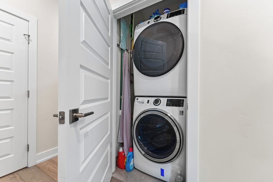 Your private washer and dryer await, tucked neatly in this convenient closet space for effortless laundry during your stay.