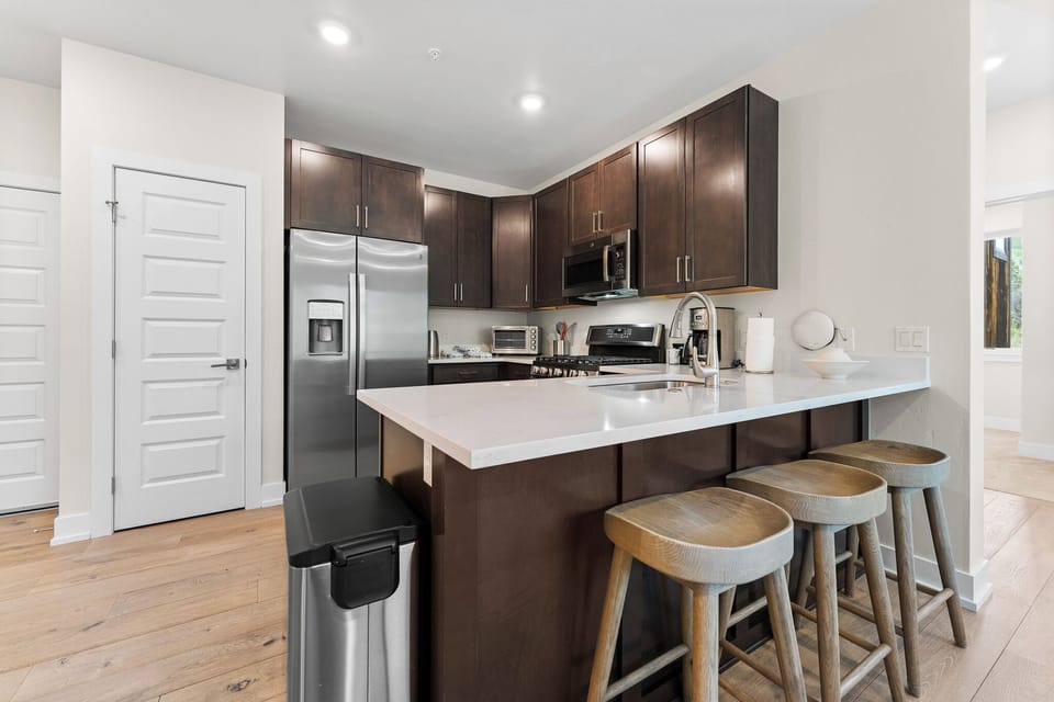 Breakfast bar with seating for three.