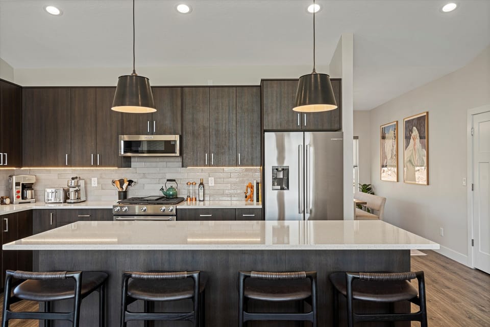 Generous kitchen island with seating for four guests.