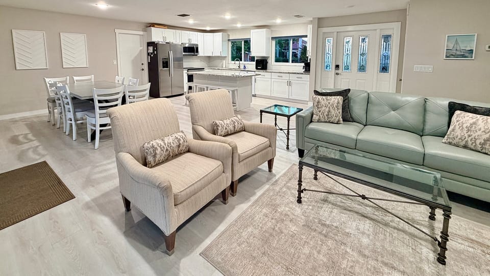 Great room: view from living room looking toward kitchen and dining area