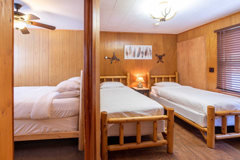 First bedroom with a full sized bed and seond bedroom with two twin beds.