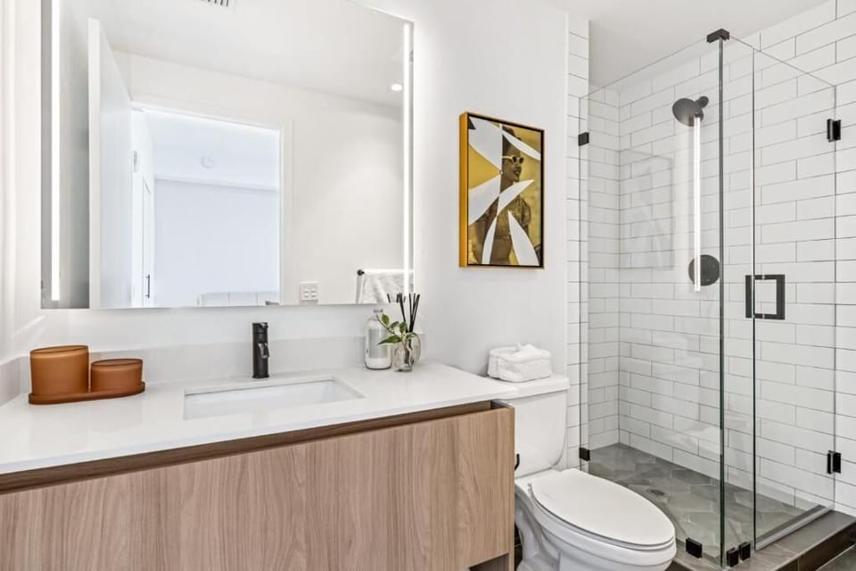 Rejuvenate in a modern bathroom with clean, calming design.