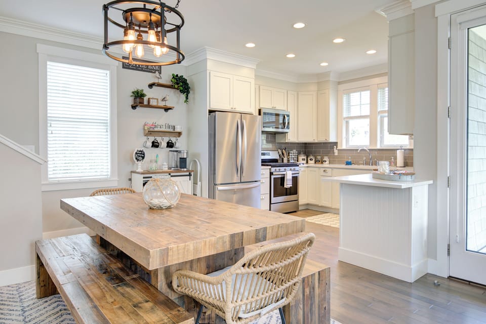 The dining room table in the open concept with the kitchen. 