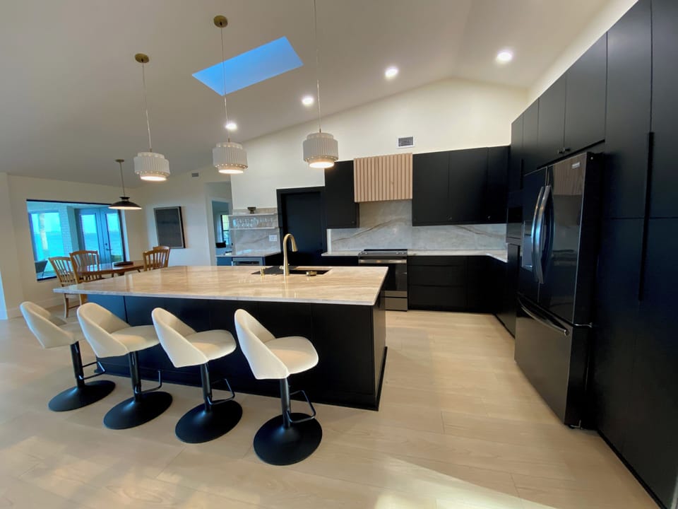 Large kitchen island seats four. 