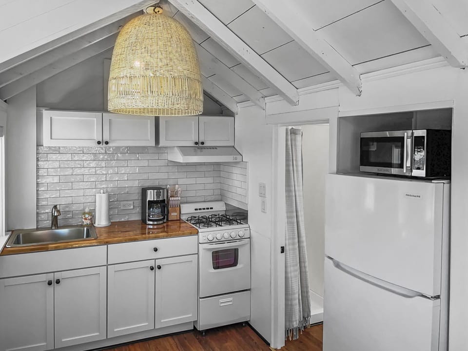 Kitchen with stove, oven and fridge - 251 Old Wharf Road Unit 57 Dennis Port - Blue Horizon