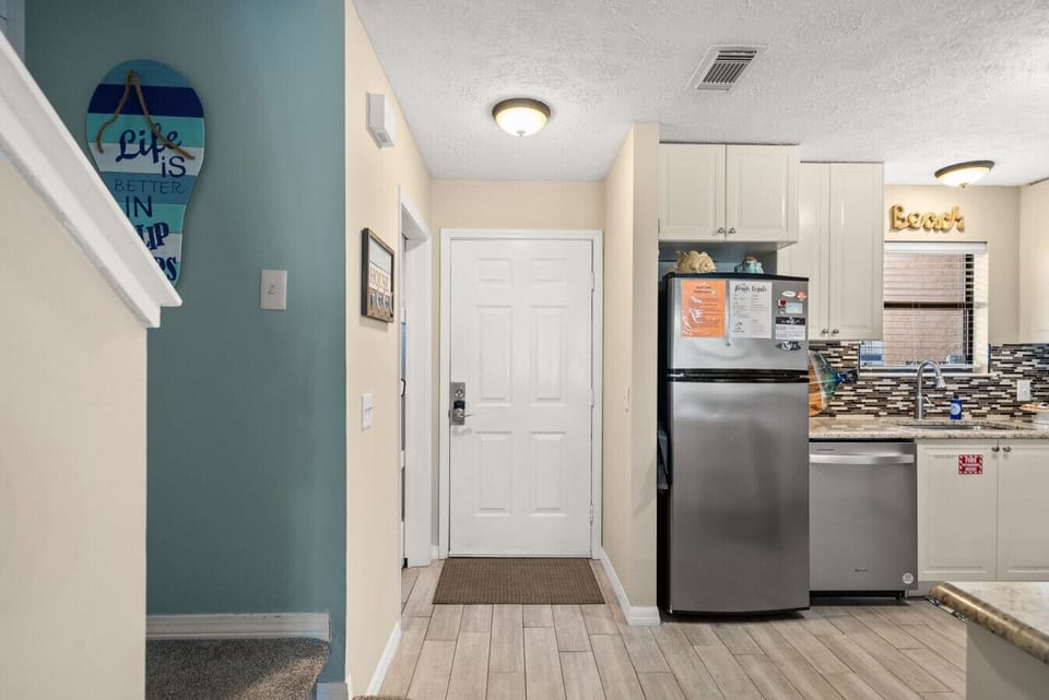 Entrance to the Home + Fully Stocked Kitchen