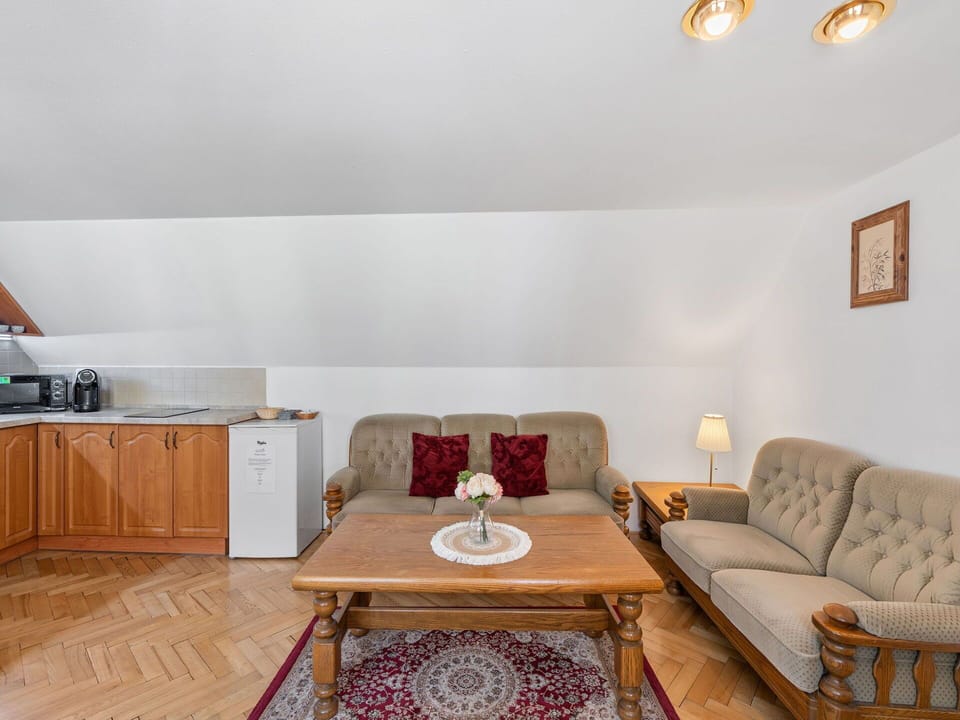 Furniture, Interior Design, Flooring, Floor, Couch, Wood, Ceiling, Room, Lighting, Living Room
