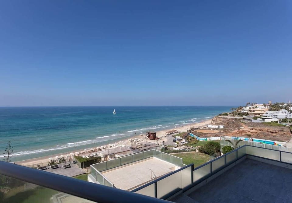 Enjoy the mesmerizing view & fantastic breeze of the Mediterranean Sea on the lovely balcony.