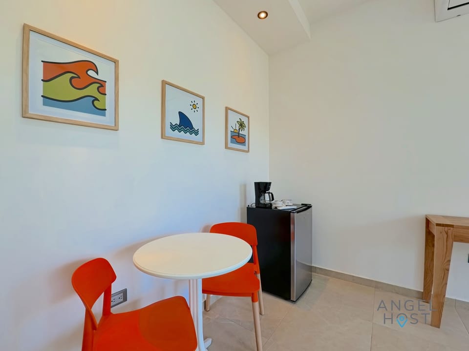 The room has a mini fridge and coffee maker available.