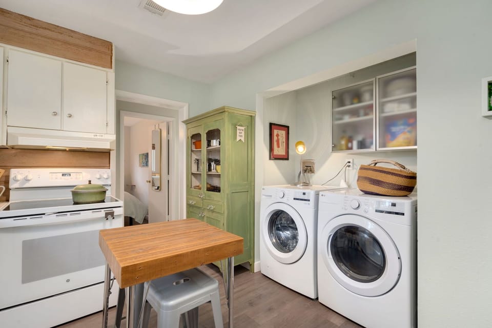 Kitchen with Laundry Facilities | Easy Access to Backyard!