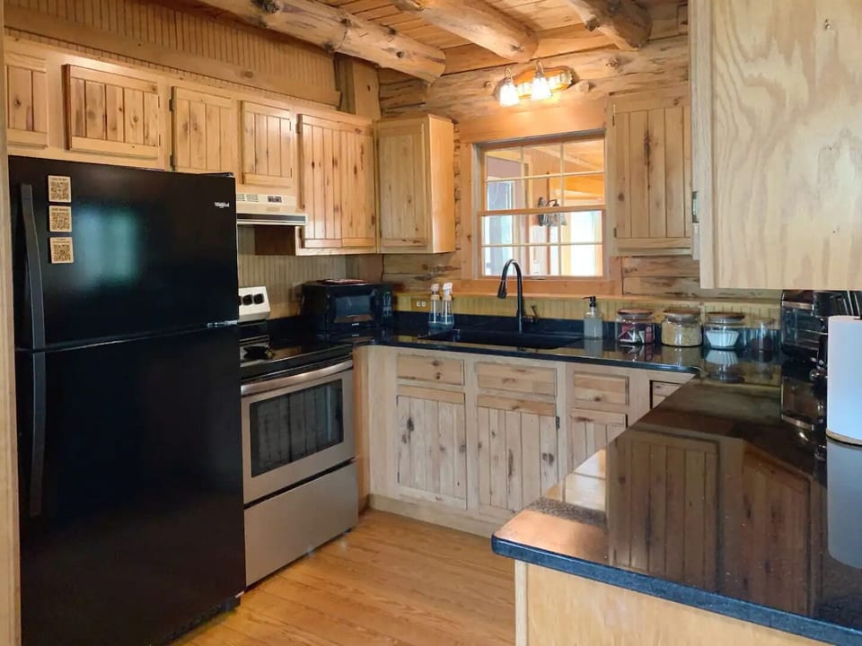 Kitchen with all cooking appliances and utensils