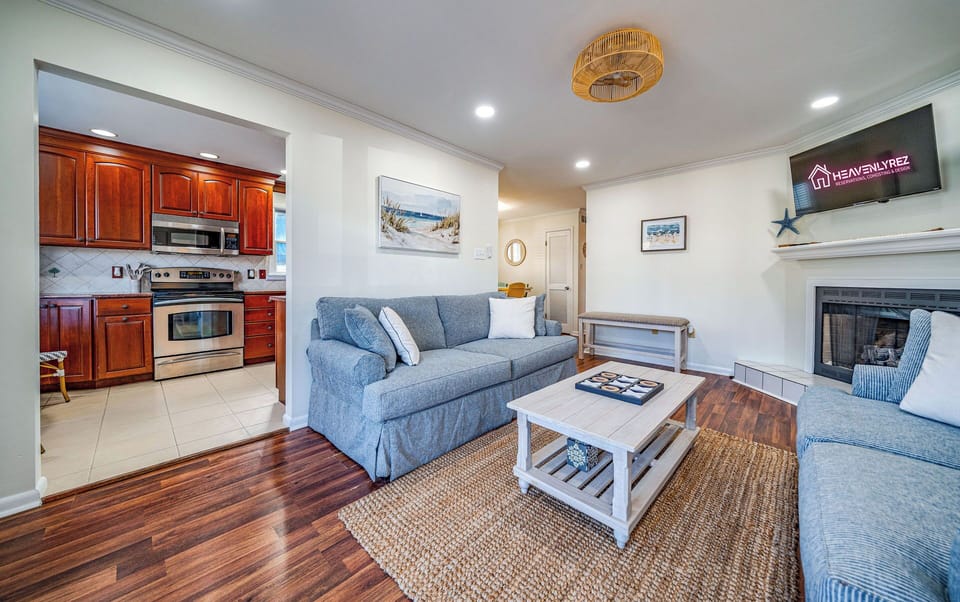 Cozy living room with fireplace and mounted TV