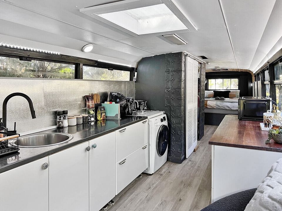 Kitchen with air fryer, microwave, portable hotplates, and basic cooking items for you to use