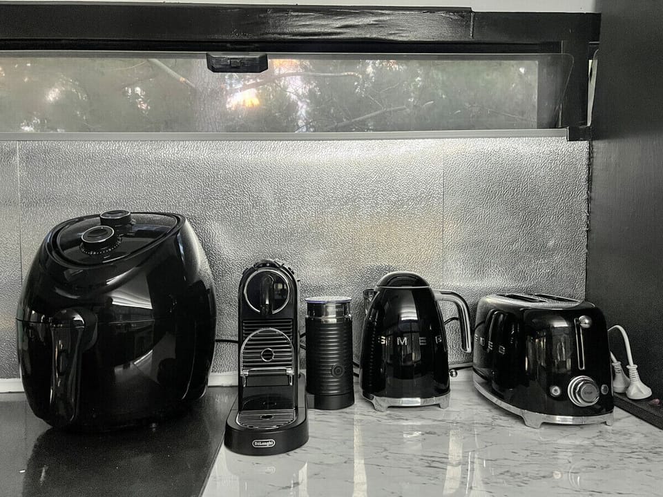 Well appointed for your stay with an airfryer, Nespresso machine & a Smeg kettle & toaster