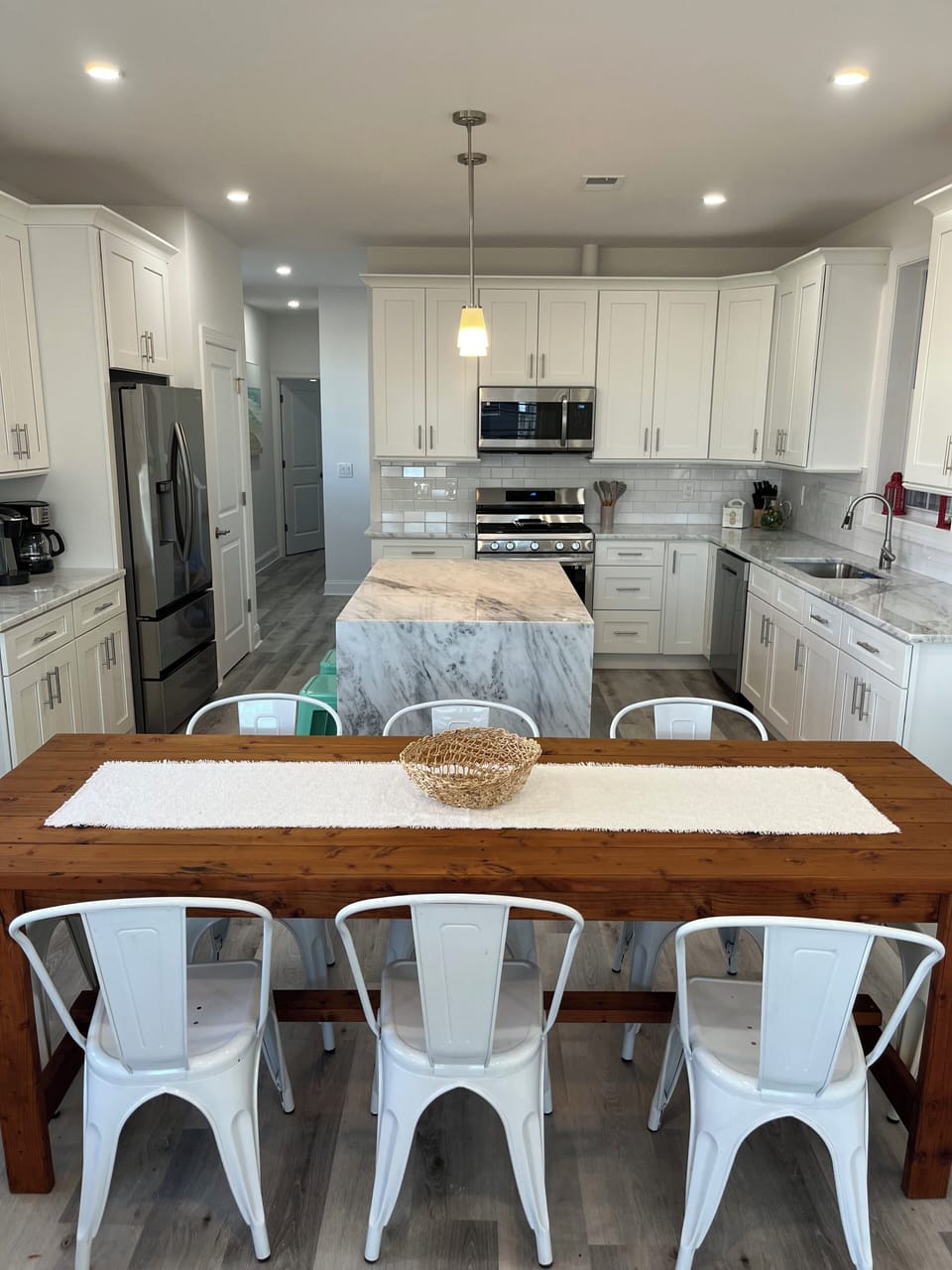 Kitchen island with seating for 4 and dining table for 8