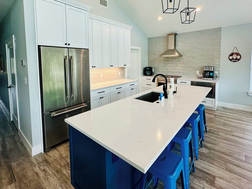 Chef’s kitchen with oversized island and premium finishes