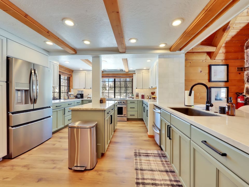 A perfect blend of high-end appliances and natural wood finishes